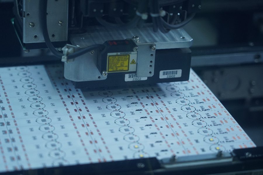 SMT line placing LEDs on PCB panels